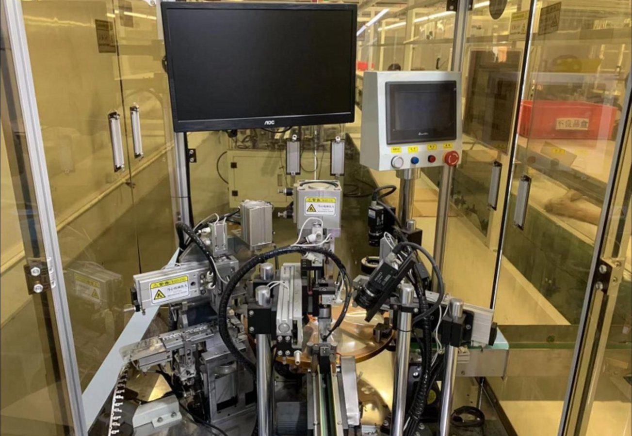 Automated riveting cell with CCD inspection camera