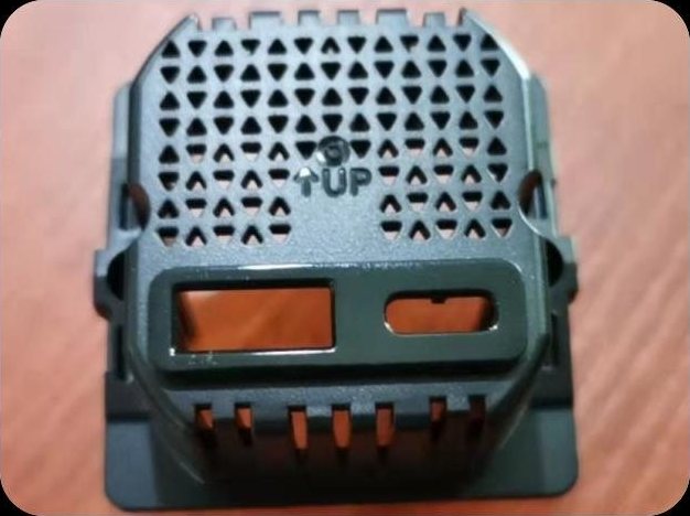 Dark grey power strip end cap with safety shutters and power inlet