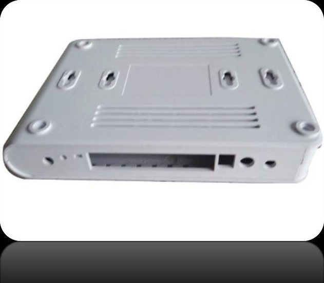 White ONT housing base with LAN port cut-outs, mounting slots and rubber feet recesses