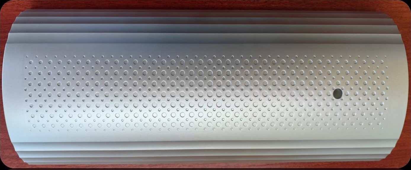 Translucent cylindrical energy storage housing with perforated texture band