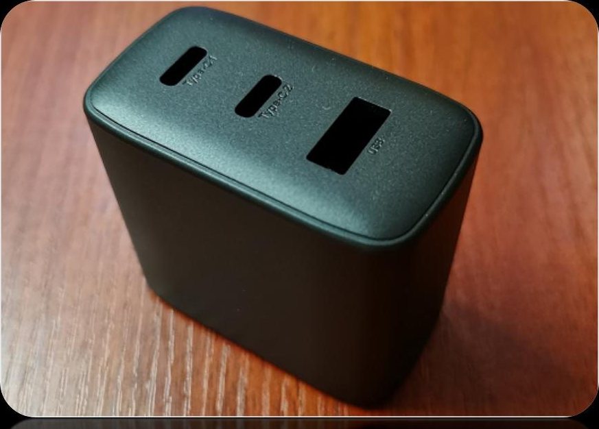 Black PD charger housing with two rectangular port openings on the top face