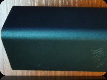 Close-up of a molded housing edge showing gloss and texture control